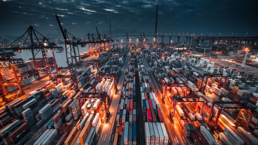 Shipping containers in port at night